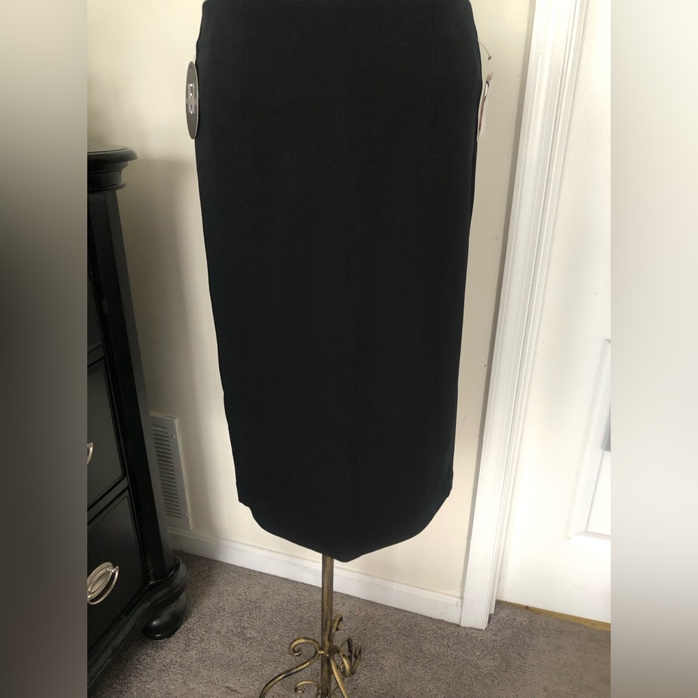 Black skirt with split in the back great for the office.